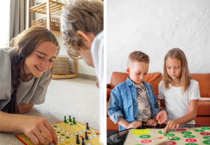 To personer spiller Ludo og to barn spiller annet bettspill.